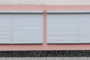white window blinds closed