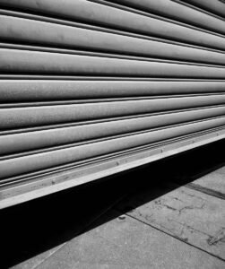 grayscale photo of a concrete building